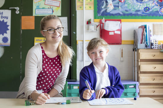 teacher and pupil at story wood school in Birmingham