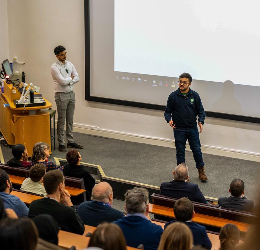 Image of Umair giving a presentation