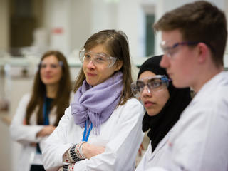 Students dressed in science uniforms