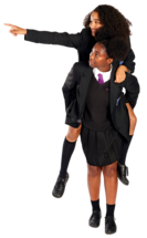 Two secondary school girls give each other a piggyback