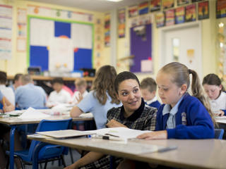 Teacher and children in classroom